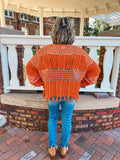 RUST KNITTED SWEATER WITH FRINGE DETAIL